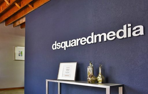 metal faced acrylic in brushed aluminum on platinum silver acrylic mounted for dsquared media lobby wall