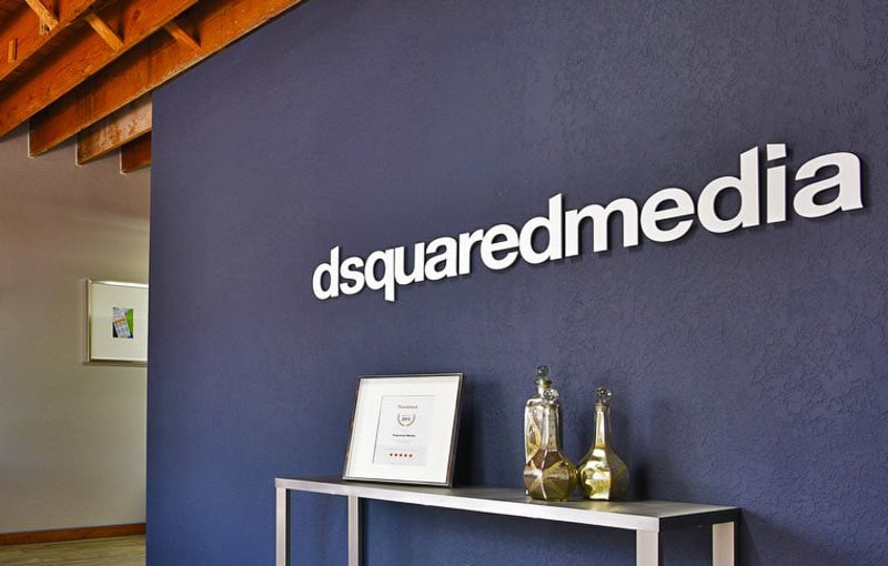 metal faced acrylic in brushed aluminum on platinum silver acrylic mounted for dsquared media lobby wall