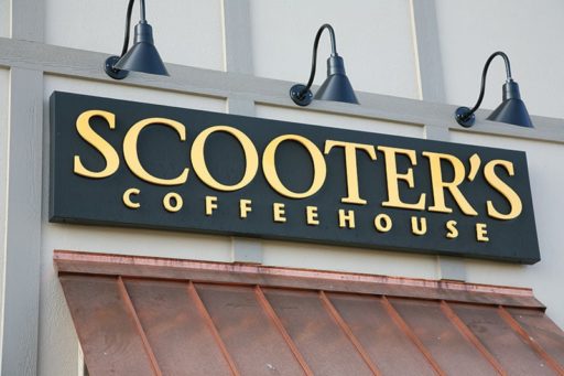painted brilliant gold acrylic letters mounted on black metal panel for scooters coffee