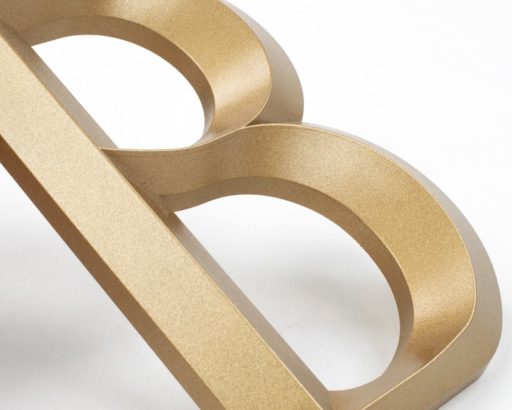 painted injection molded minnesota letters architectural metallic gold