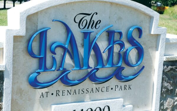 Custom formed plastic letters on a neighborhood entrance monument
