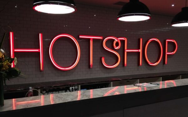 Red LED acrylic neon store sign — Hotshop