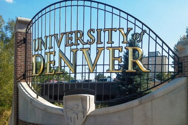 Cast metal prismatic-face letters for the University of Denver
