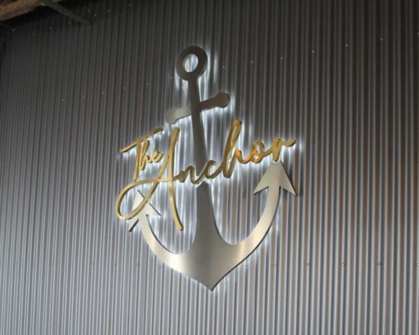 Brushed brass and stainless backlit letters with 5000K LEDs — The Anchor