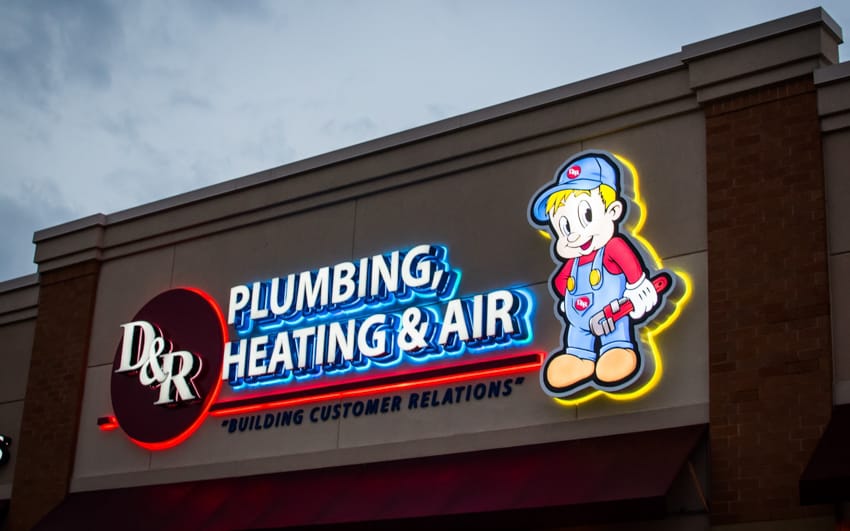 Dual-lit channel letters with face and halo illumination for a plumbing company