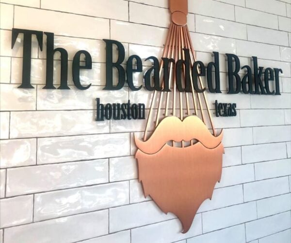 Brushed solid copper dimensional letters — Bearded Baker interior