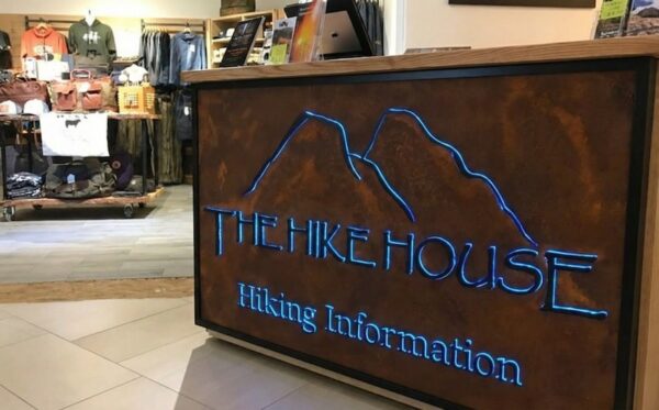 Push through cabinet sign with a faux rusted cabinet and blue leds