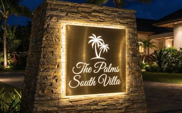 Push through acrylic sign with a polished brass face — The Palms
