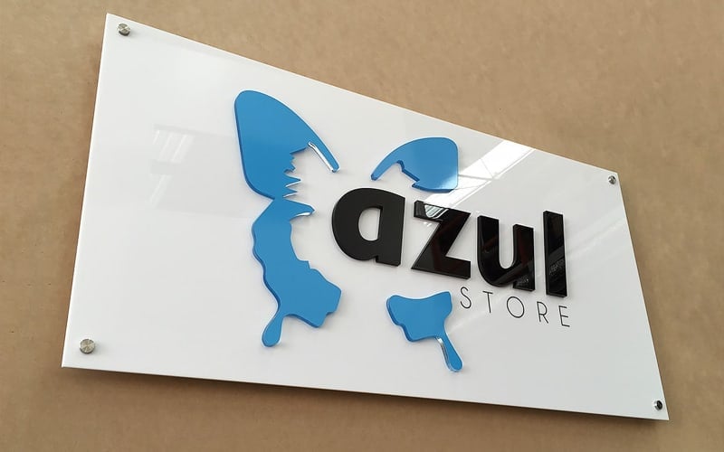 Acrylic logo on a white acrylic panel — Azul reception wall sign