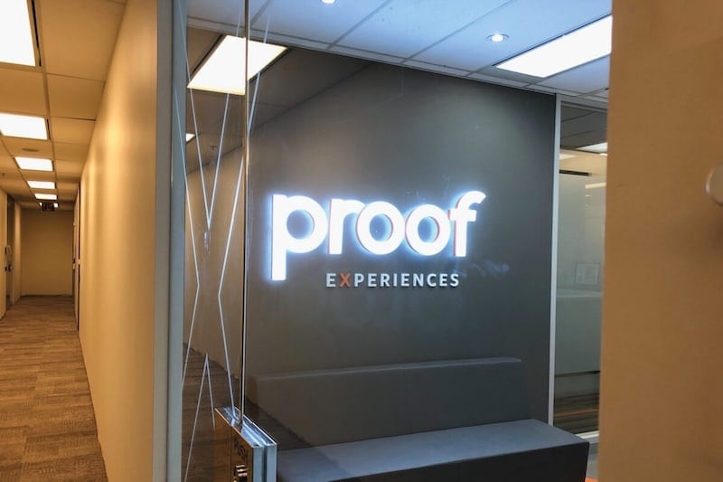 Front-lit acrylic letters installed in a corporate office lobby