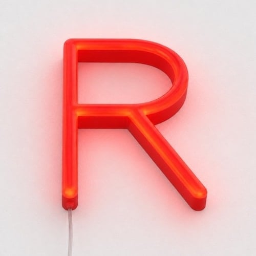 Red LED acrylic neon letter mounted flush to the wall with a backer cut to the letter shape